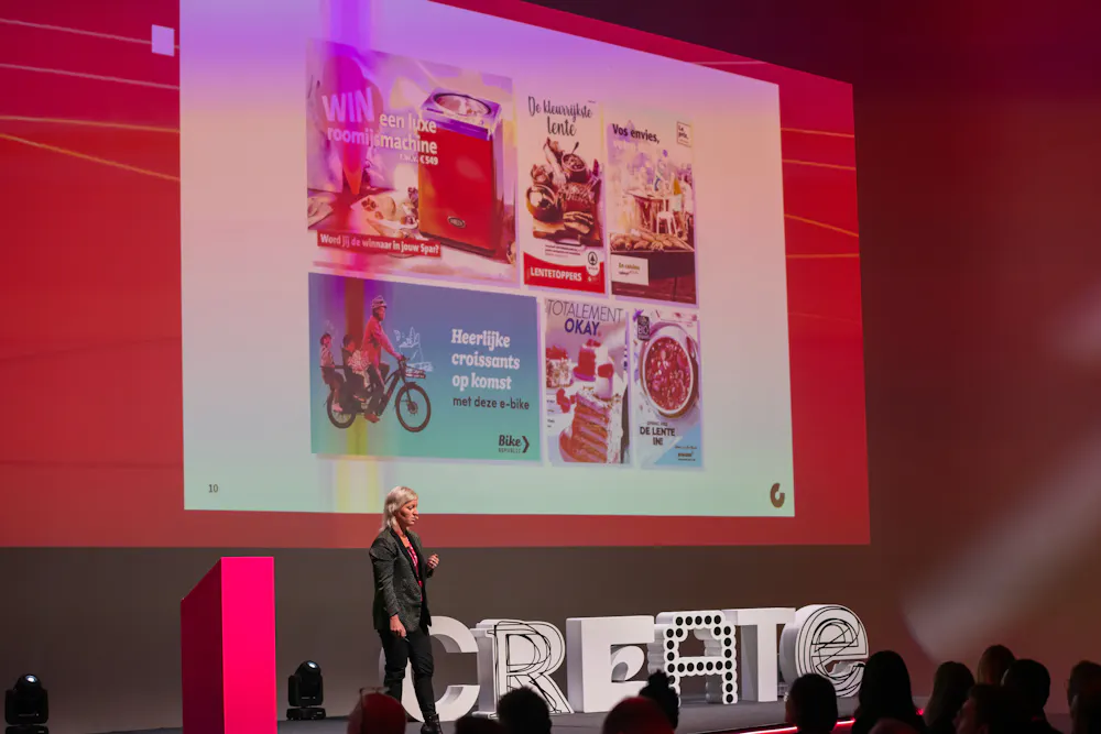 Speaker presenting Colruyt Group retail campaigns at CREATE.